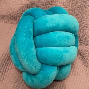 Teal knot pillow
